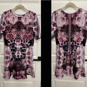 Scuba elbow sleeve exposed zipper dress. Size Large